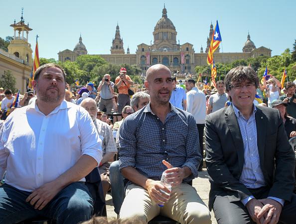 Oriol Junquera, Pep Guardiolam dan Carles Puigdemont Copyright: Getty Image