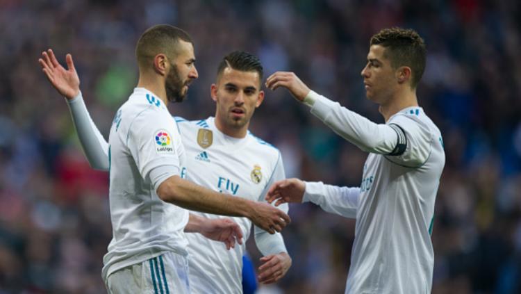 Ronaldo dan Benzema saat merayakan gol bersama. Copyright: Getty Images