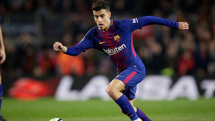 Philipe Coutinho beraksi saat melawan Girona. Copyright: INDOSPORT