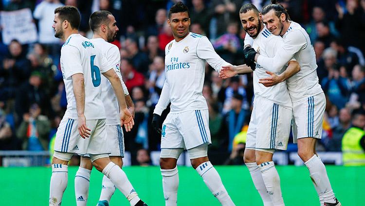 Pemain Real Madrid merayakan gol Karim Benzema usai gol penalti pada menit ke-89'.