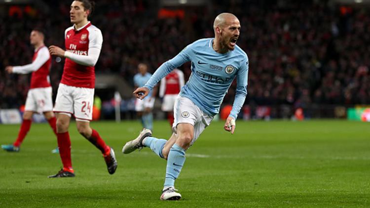 David Silva turut menambah derita kekalahan Arsenal dalam laga final Piala Liga Inggris. Copyright: INDOSPORT