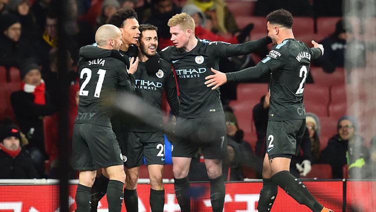 Selebrasi pemain Manchester City usai membobol gawang Arsenal.