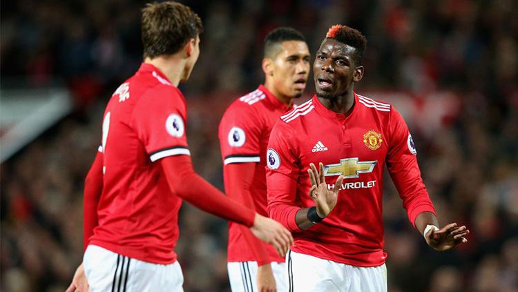 Paul Pogba dan Victor Lindelof - INDOSPORT