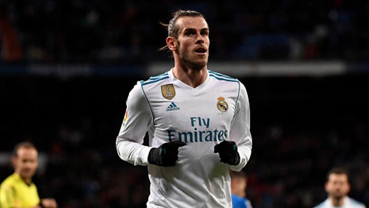 Gareth Bale usai mencetak gol pertama saat melawan Getafe. Copyright: Getty Images