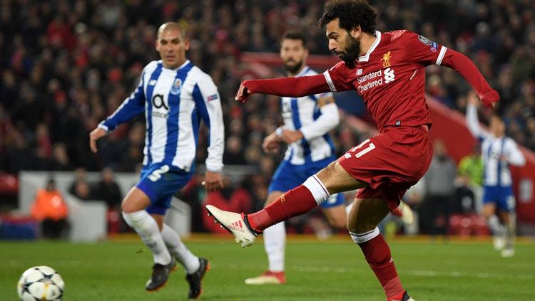 Mohamed Salah mencoba melepaskan tendangan ke gawang Porto. Copyright: Twitter @ChampionsLeague