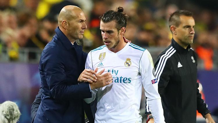 Indosport - Zinedine Zidane dan Gareth Bale
