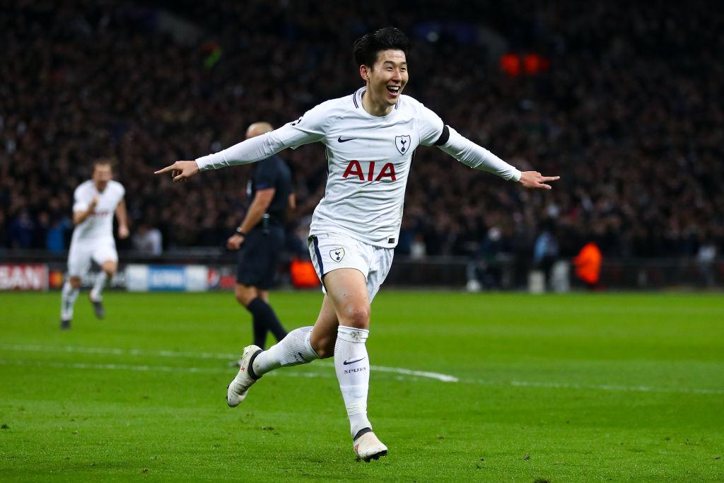 Selebrasi Son Heung Min setelah cetak gol pertama. Copyright: GettyImages