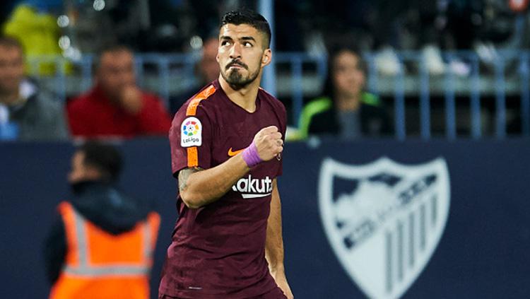 Luis Suarez.