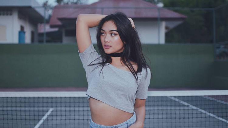 Potret seksi Marion Jola. - INDOSPORT
