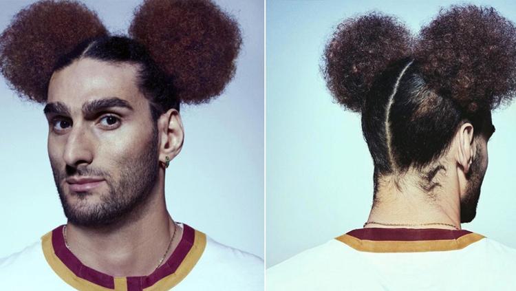 Gaya rambut nyentrik Fellaini. - INDOSPORT