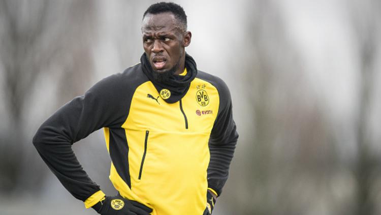 Mantan pelari Usain Bolt saat ikut latihan Borussia Dortmund.