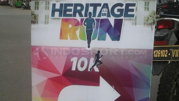 Petunujuk arah Heritage Run di Kota Tua.