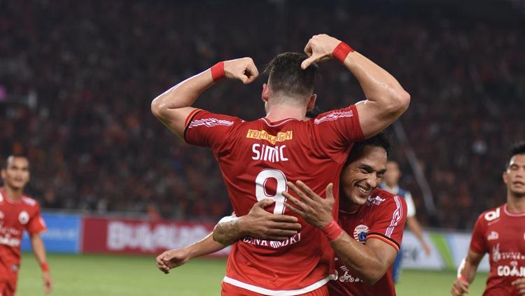 Aksi selebrasi pemain Persija Jakarta setelah Marko Simic berhasil mencetak gol ke gawang Arema FC.