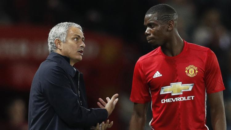 Jose Mourinho dan Paul Pogba.