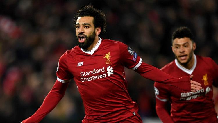 Selebrasi Mo Salah setelah cetak gol pertama.