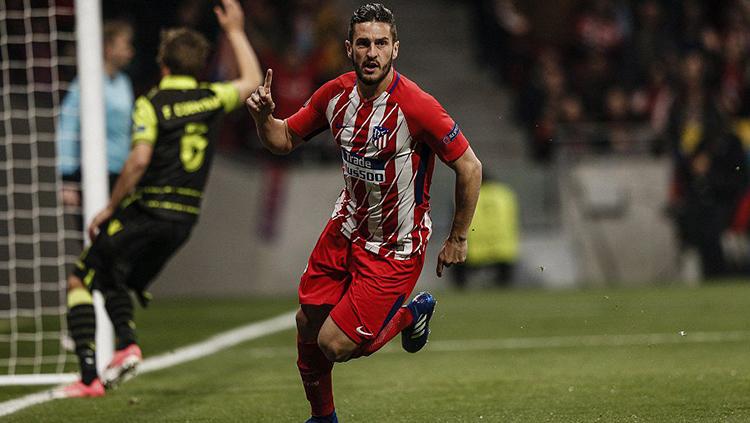 Koke saat membuka keunggulan Atletico Madrid saat melawan Sporting Lisbon.