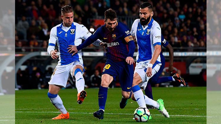 Lionel Messi saat membawa bola Copyright: INDOSPORT