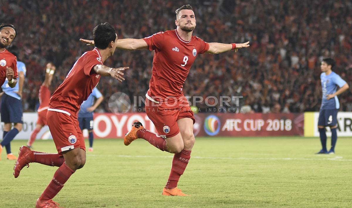 Selebrasi Marko Simic usai mencetak gol pertama ke gawang JDT.