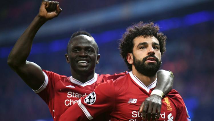 Dua pemain Liverpool, Sadio Mane dan Mohamed Salah.