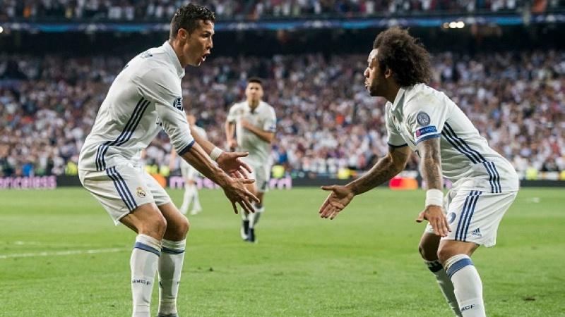 Ronaldo dan Marcelo berselebrasi pasca mengandaskan Bayern Munchen. Copyright: INDOSPORT