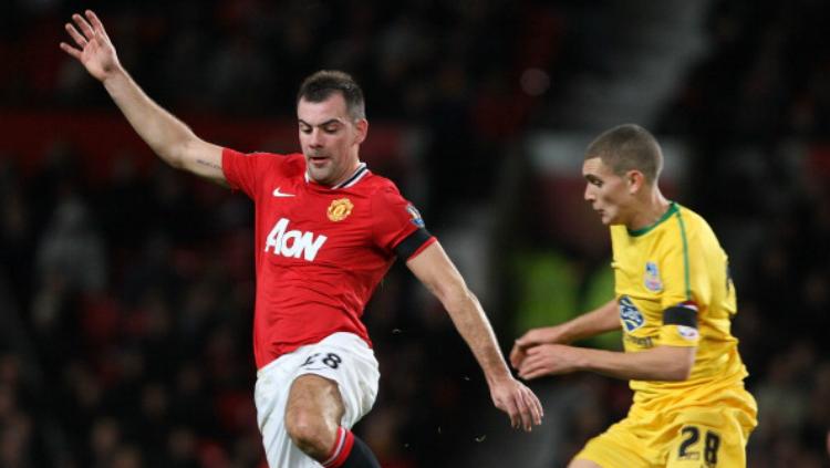 Darron Gibson saat masih berseragam Manchester United. - INDOSPORT