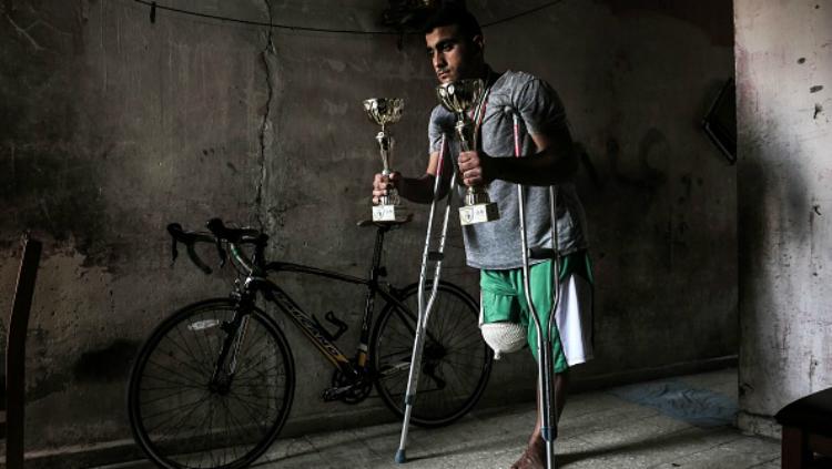 Alaa Al-Daly, atlet sepeda Palestina yang kakinya diamputasi karena tertembak tentara Israel. - INDOSPORT