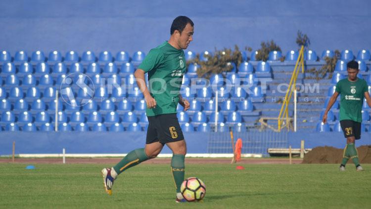 Yu Hyun-koo, pemain Sriwijaya FC saat sedang latihan.
