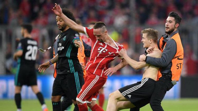 Suporter di laga Munchen vs Madrid. Copyright: Reuters