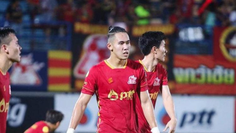 Pemain PTT Rayong Ryuji Utomo. - INDOSPORT