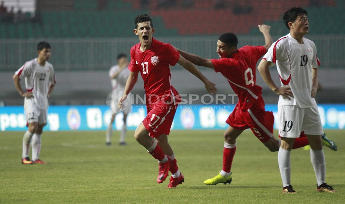 Selebrasi pemain Bahrain, Jasim Alsalama usai mencetak gol kedua ke gawang Korea Utara. Herry Ibrahim