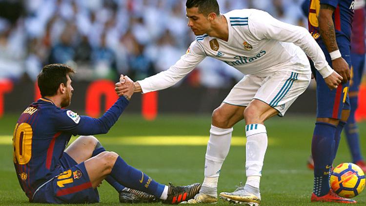 Lionel Messi (kiri/Barcelona) dan Cristiano Ronaldo (Real Madrid). Copyright: INDOSPORT