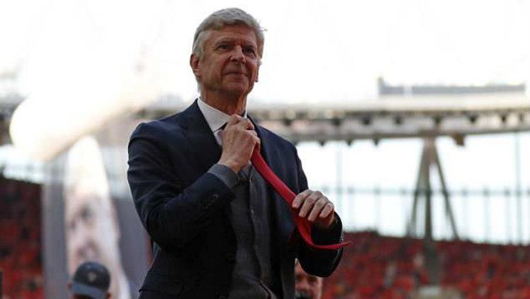 Aksi terpuji Arsene Wenger Copyright: Getty Image