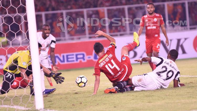 Persija vs Madura United. Copyright: INDOSPORT/Herry Ibrahim