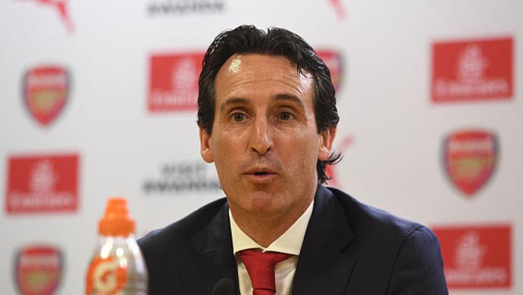 Unai Emery, pelatih Arsenal, menghadapi kendala besar jika ingin mendatangkan striker Crystal Palace, Wilfried Zaha.