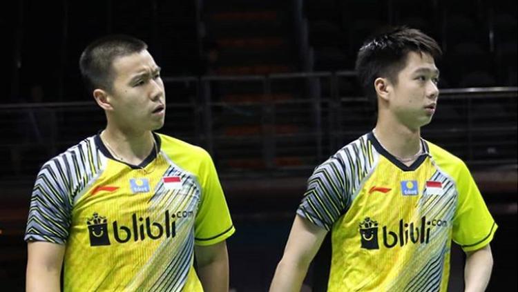 Kevin Sanjaya/Marcus Gideon dengan tampang tengilnya. - INDOSPORT