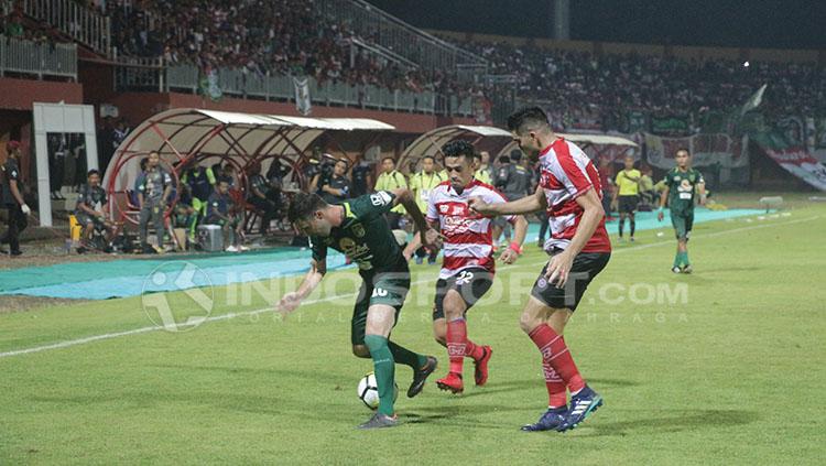Madura United vs Persebaya.