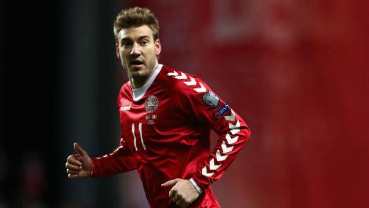 Nicklas Bendtner saat bermain untuk Timnas Denmark. Copyright: Getty Images