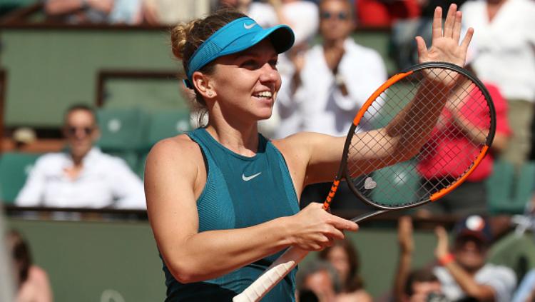 Simona Halep melangkah ke final Prancis Terbuka 2018 usai tundukkan Garbine Muguruza. - INDOSPORT