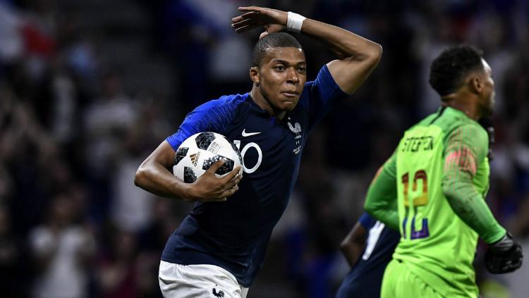 Kylian Mbappe merayakan golnya untuk Timnas Prancis saat menghadapi Amerika Serikat. - INDOSPORT