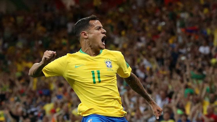 Selebrasi Philippe Coutinho usai membuka keunggulan Brasil atas Swiss di Piala Dunia 2018. Copyright: Twitter @SquawkaNews