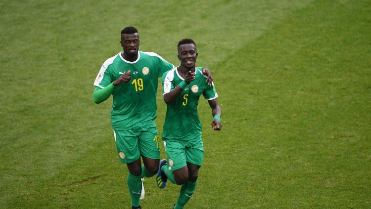 Skuat Senegal merayakan gol kedua ke gawang Polandia di laga Grup H Piala Dunia 2018, Selasa (19/06/18). - INDOSPORT