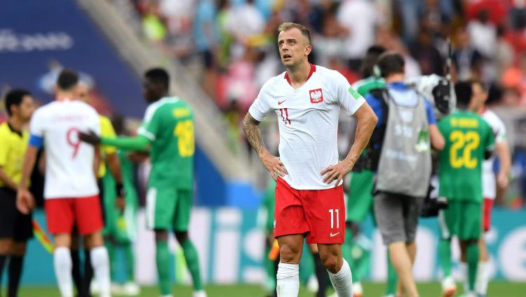 Penyerang Timnas Polandia, Kamil Grosicki, saat kalah dari Senegal di Piala Dunia 2018. - INDOSPORT