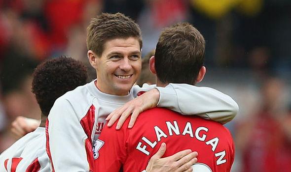 Steven Gerrard memeluk Jon Flanagan Copyright: Daily Express