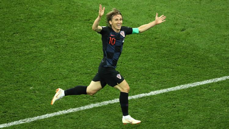 Luka Modric selebrasi usai laga Argentina vs Kroasia di Piala Dunia 2018. Copyright: INDOSPORT
