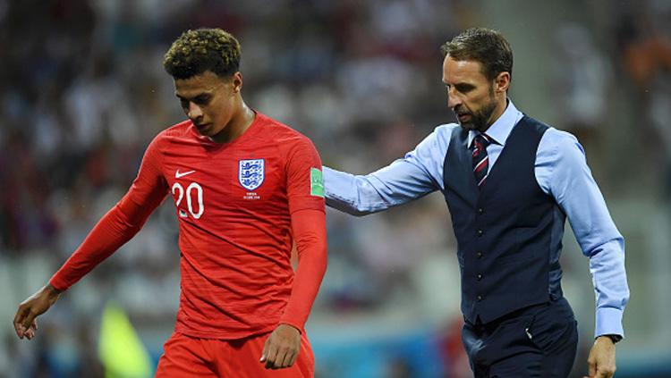 Gelandang serang dan pelatih Timnas Inggris, Dele Alli (kiri) dan Gareth Southgate. Copyright: INDOSPORT