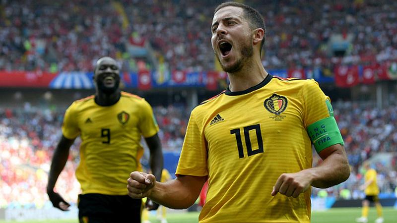 Indosport - Eden Hazard merayakan golnya ke gawang Tunisia