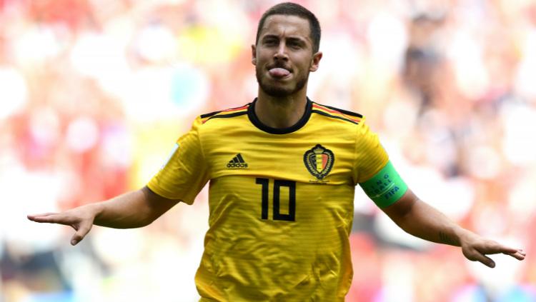 Eden Hazard saat merayakan dua golnya untuk Belgia. - INDOSPORT