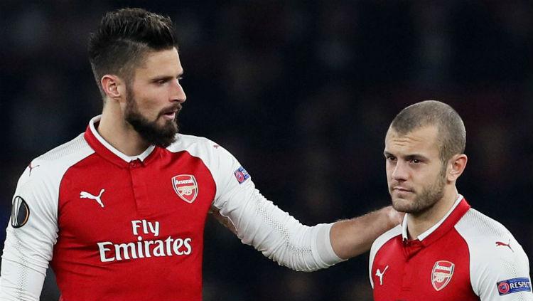 Olivier Giroud (kanan) dan Jack Wilshere (kiri) saat masih membela Arsenal.