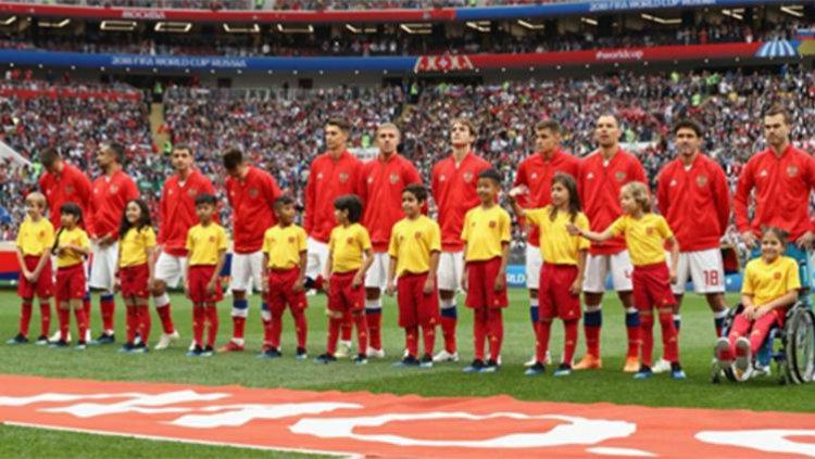 Player escort Tim Nasional Rusia di Piala Dunia 2018.