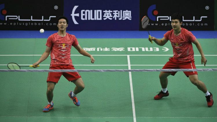 Pasangan ganda putra asal China, He Jiting/Tan Qiang, dipastikan ‘berpisah’ saat melakoni ajang Korea Masters 2022 setelah dihukum BWF karena match fixing. - INDOSPORT